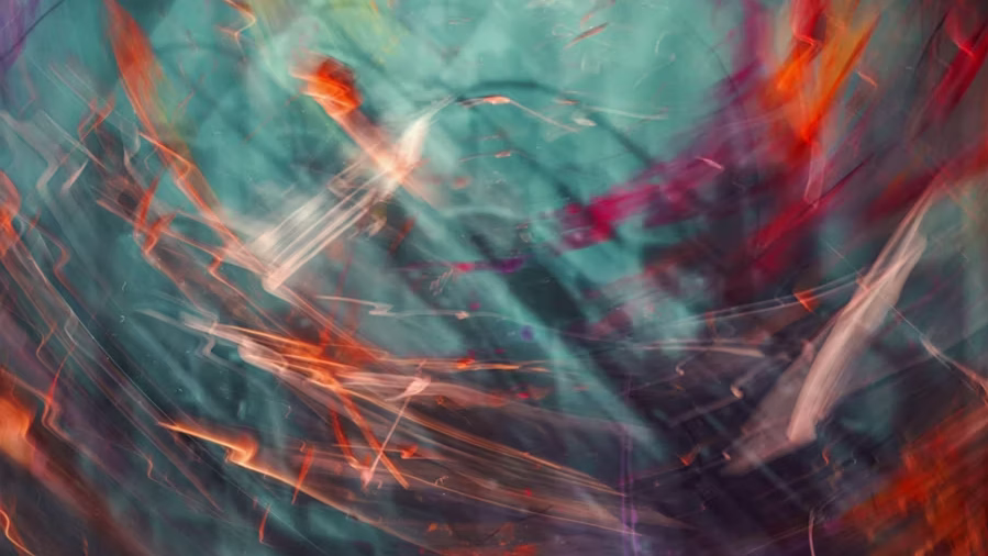 An abstract image featuring energetic, swirling light trails in vibrant shades of neon orange, deep red, and bright white, set against a mottled, dark teal and cyan background. The blurred, sweeping lines create a dynamic sense of fluid motion, resembling long-exposure photography or energetic, glowing brushstrokes.